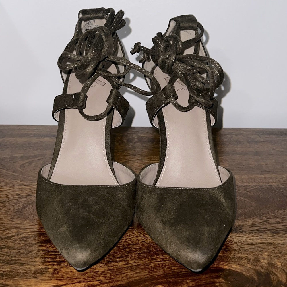 Olive green pointy high heels.